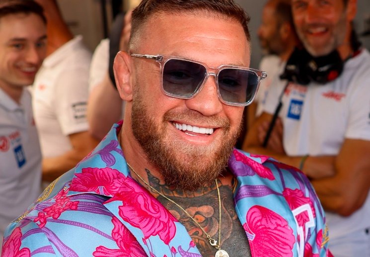 conor mcgregor smiling with sunglasses