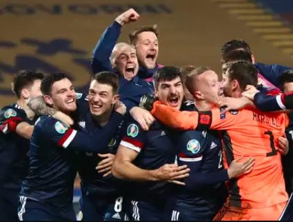 scotland fans celebrating euro qualification