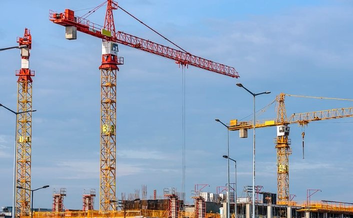 Scottish construction site with cranes and scaffolding