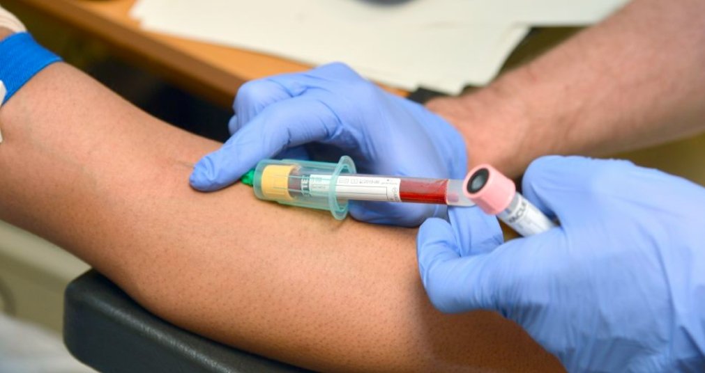nurse syringe vaccination clinic UK measles