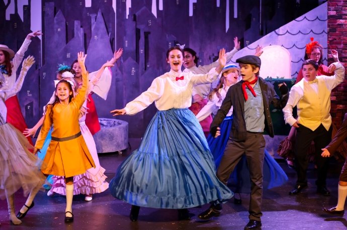 theater students performing on stage