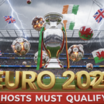A viral, hyper-realistic YouTube thumbnail with a dramatic stadium atmosphere. The background is a storm-lit Wembley Stadium packed with restless fans waving Union Jacks, Irish tricolours, Scottish Saltire and Welsh flags under heavy rain and lightning flashes. The composition uses a low-angle cinematic shot to focus on the main subject: a gleaming metallic UEFA European Championship trophy floating in the centre with qualification draw balls exploding around it. The image features massive 3D typography with strict hierarchy: The Primary Text reads exactly: 'EURO 2028'. This text is massive, the largest element in the frame, rendered in molten gold chrome with dramatic rim lighting to look like a high-budget 3D render. The Secondary Text reads exactly: 'HOSTS MUST QUALIFY'. This text is significantly smaller, positioned below the main text with a thick red warning-style border and glowing edge effect to contrast against the stormy background. Make sure text 2 has completely different style and effect from text 1. The text materials correspond to the story's concept. Crucial Instruction: There is absolutely NO other text, numbers, watermarks, or subtitles in this image other than these two specific lines. 8k, Unreal Engine 5, cinematic rende