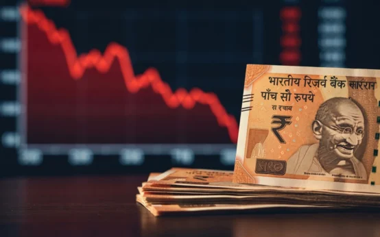 Indian rupee record low against US dollar amid Sensex Nifty market drop.