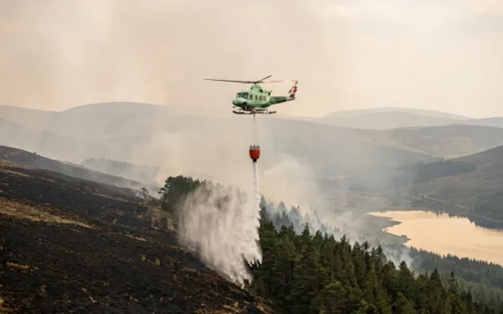 helicopters waterbombing Cairngorms wildfire Glenmore Forest Scotland
