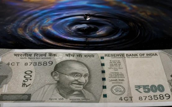 rupee gains against dollar as Brent crude falls to $92 a barrel